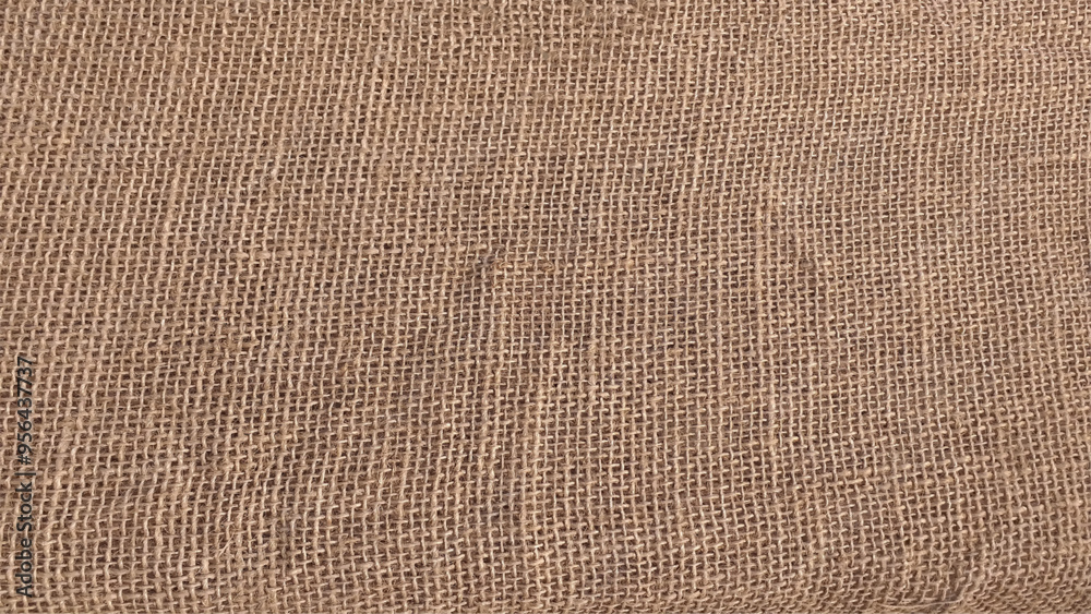 Detailed close-up of natural burlap fabric texture with woven pattern. Sackcloth or burlap texture. Closeup of natural sackcloth, canvas, fabric, jute, pattern for background Detailed close-up of natural burlap fabric texture with woven pattern. Sackcloth or burlap texture. Closeup of natural sackcloth, canvas, fabric, jute, pattern for background