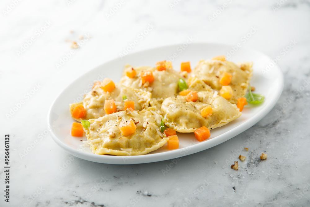 Homemade pumpkin ravioli with herbs and cheese Homemade pumpkin ravioli with herbs and cheese