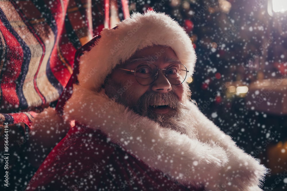 Photo of amazed positive retired man saint nicholas sitting home lapland preparing enjoying favorite winter frosty snowy weather outdoor