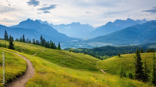a remote mountain landscape with rugged peaks, winding trails, and a distant city visible in the valley below, capturing the grandeur of nature