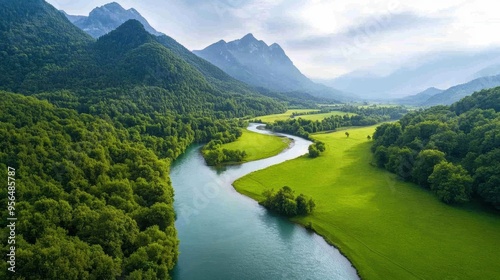 a river winding through a lush green valley, with crystal-clear water reflecting the surrounding trees and mountains, a peaceful and idyllic scene
