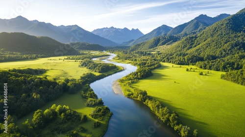 a river winding through a lush green valley, with crystal-clear water reflecting the surrounding trees and mountains, a peaceful and idyllic scene
