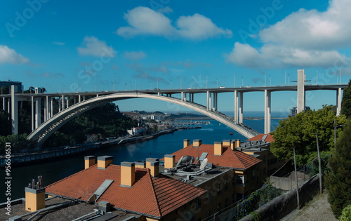 White and modern bridge over Douro (Duero) river in Porto - Ponte da Arrabida