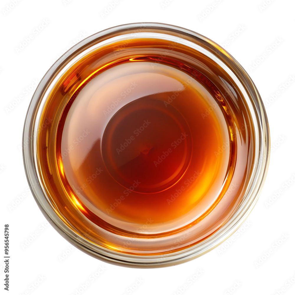 A top view clear glass Bowl of Maple Syrup isolated on a transparent background A top view clear glass Bowl of Maple Syrup isolated on a transparent background