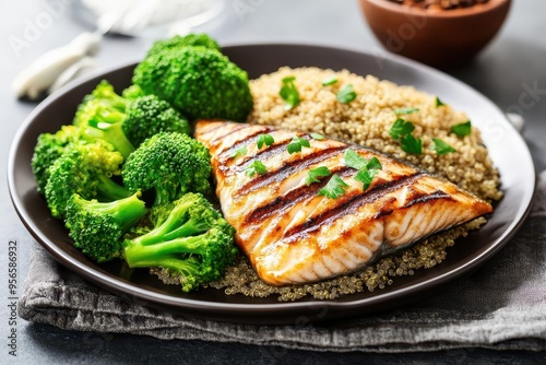 Grilled mackerel with quinoa and steamed broccoli, high in omega-3s, brain health and wellness