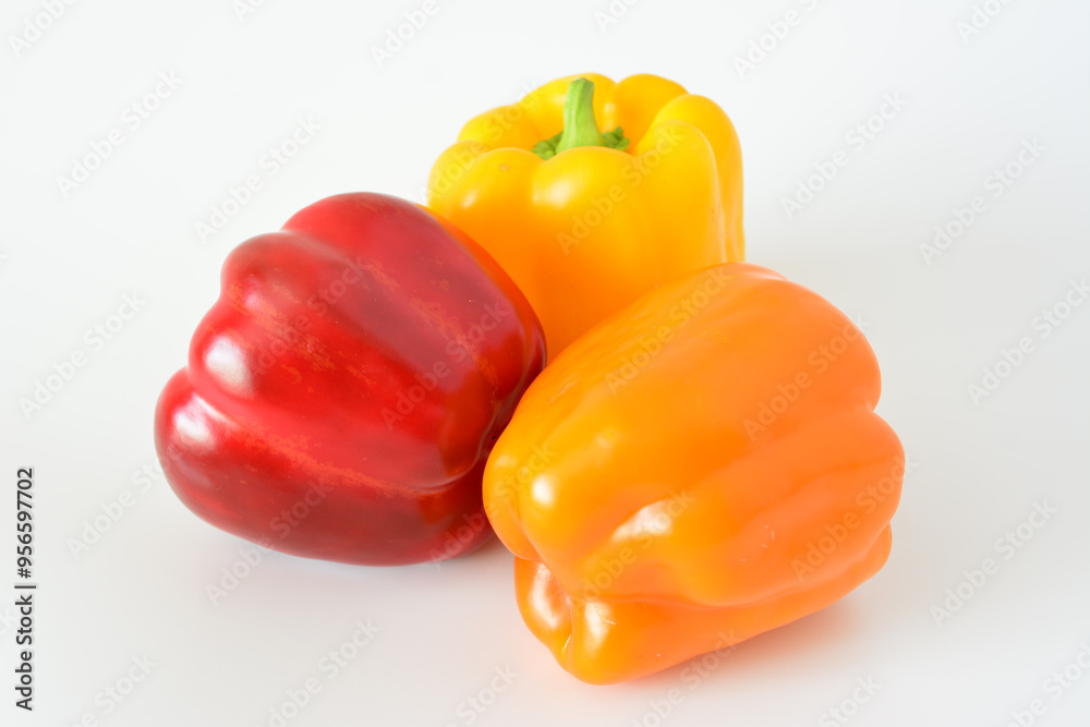 three bell peppers isolated on the white background close up three bell peppers isolated on the white background close up