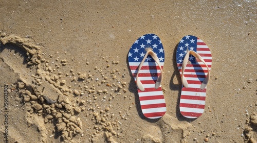 Patriotic USA background with flip flops on the sandy beach