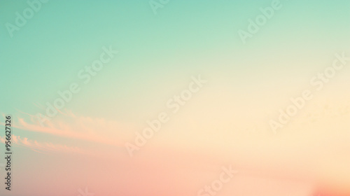 Minimalist pastel sky with soft gradient colors at dawn