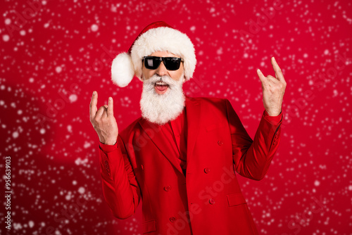 Photo of retired pensioner crazy happy old man wear sunglass rock signs sants claus isolated on red color background