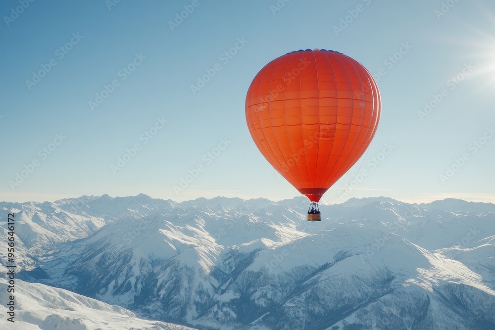 Orange Hot Air Balloon Soaring Over Snowy Mountains Orange Hot Air Balloon Soaring Over Snowy Mountains