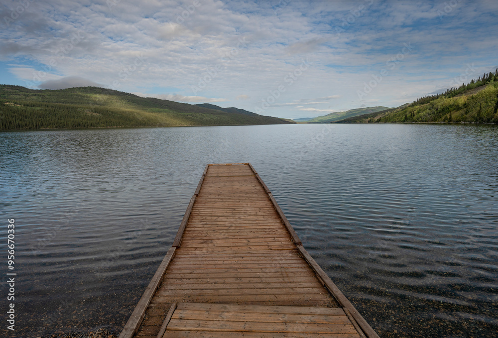 Wooden boat dock at Fox Lake in Yukon, Canada Wooden boat dock at Fox Lake in Yukon, Canada