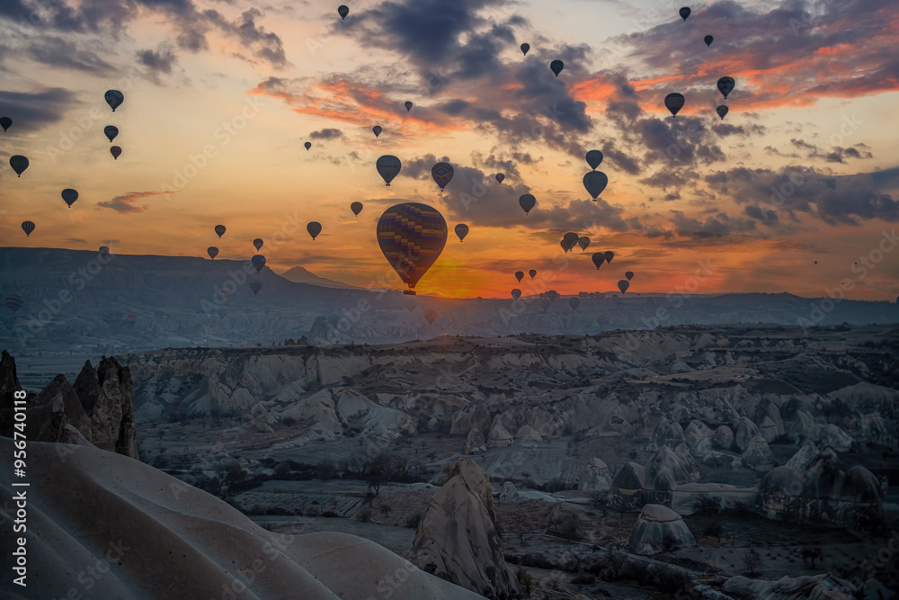 Turkey Cappadocia big tourist attraction - balloon flight. Cappadocia is recognized worldwide as one of the best places to fly with hot air balloons. Balloons in Cappadocia at sunset.