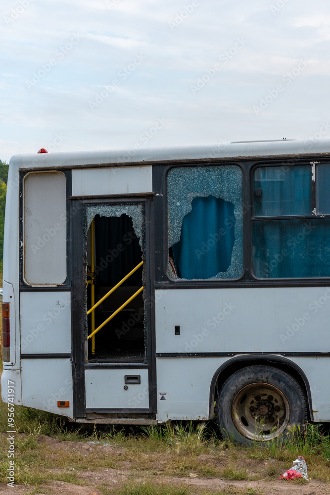 Broken glass in the bus. Shooting, bullet hole concept. High quality photo. Broken glass in the bus. Shooting, bullet hole concept. High quality photo.