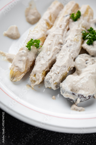 white asparagus in cream sauce fresh meal food snack on the table copy space food background rustic top view