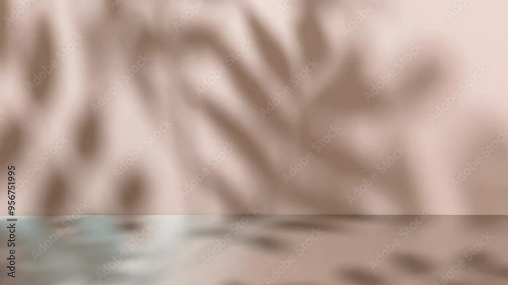 The timeless elegance of nature reflected in moving leaf shadows on a smooth brown wall within an empty space.