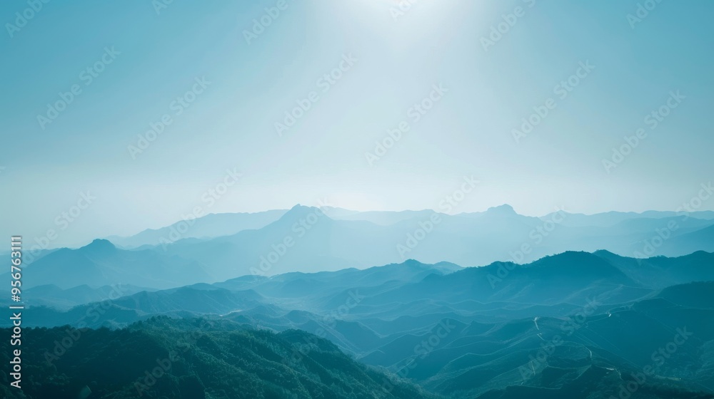 Fototapeta premium Serene mountain landscape with a clear sky