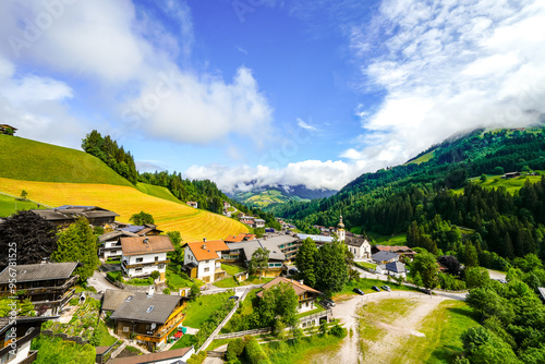 View of Auffach and the surrounding landscape. Idyllic town in the municipality of Wildschönau in the Kufstein district in Austria. Nature with mountains in Tyrol. 