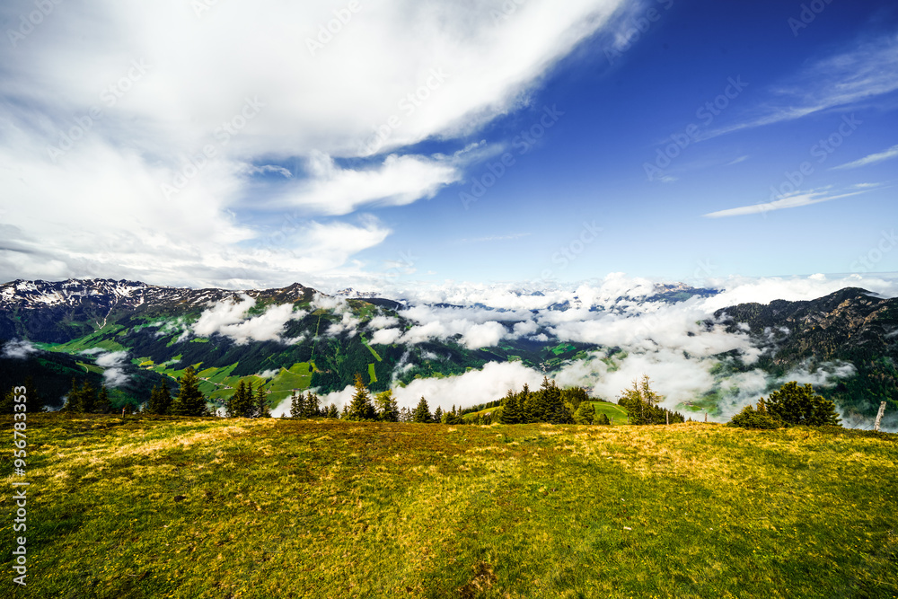 View from Schatzberg of the surrounding landscape. Idyllic nature in Wildschönau in the Kufstein district in Austria. Mountain landscape in the Kitzbühel Alps in Tyrol.
View from Schatzberg of the surrounding landscape. Idyllic nature in Wildschönau in the Kufstein district in Austria. Mountain landscape in the Kitzbühel Alps in Tyrol.