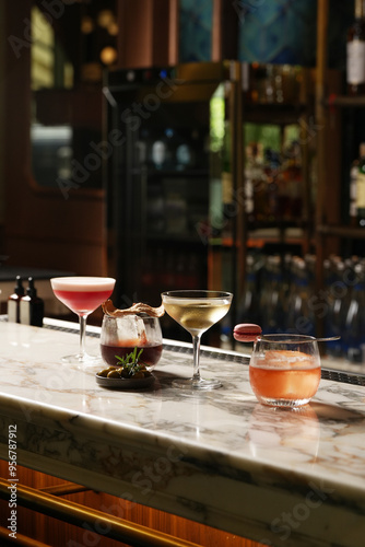 Set of various cocktails on bar counter. Assortment of alcoholic cocktails on restaurant bar