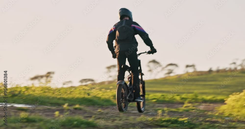 E bike, energy and sunset with person in nature for sustainability, cycling and travel. Peace, environment and speed with ride on dirt path trail for challenge, carbon footprint and transportation E bike, energy and sunset with person in nature for sustainability, cycling and travel. Peace, environment and speed with ride on dirt path trail for challenge, carbon footprint and transportation