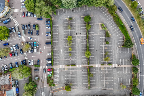 Aerial drone shot of a person walking by the river