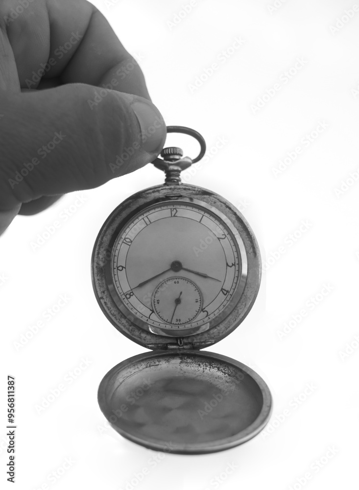 round pocket watch. Hand holding pocket watch in retro vintage style back and white color .Concept of man with their own time. isolated on white background. round pocket watch. Hand holding pocket watch in retro vintage style back and white color .Concept of man with their own time. isolated on white background.