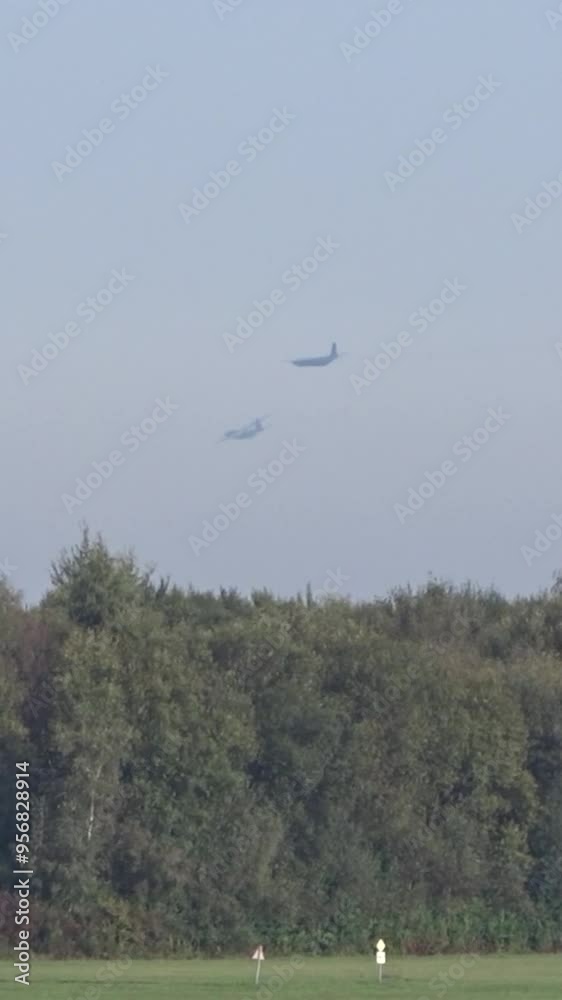 military transport planes flying low altitude over dense forest, their maneuverability operational flexibility aircraft military planes aviation flight jet aircraft movement military aircraft military transport planes flying low altitude over dense forest, their maneuverability operational flexibility aircraft military planes aviation flight jet aircraft movement military aircraft