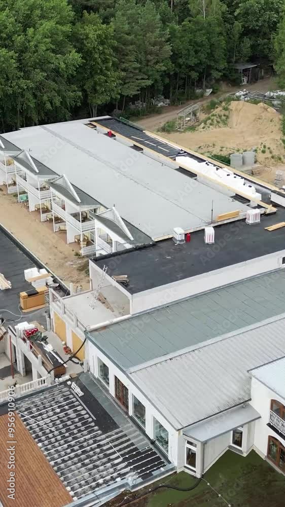 Panorama See Resort & Spa hotel aerial forward drone footage surrounded by forest in construction building
