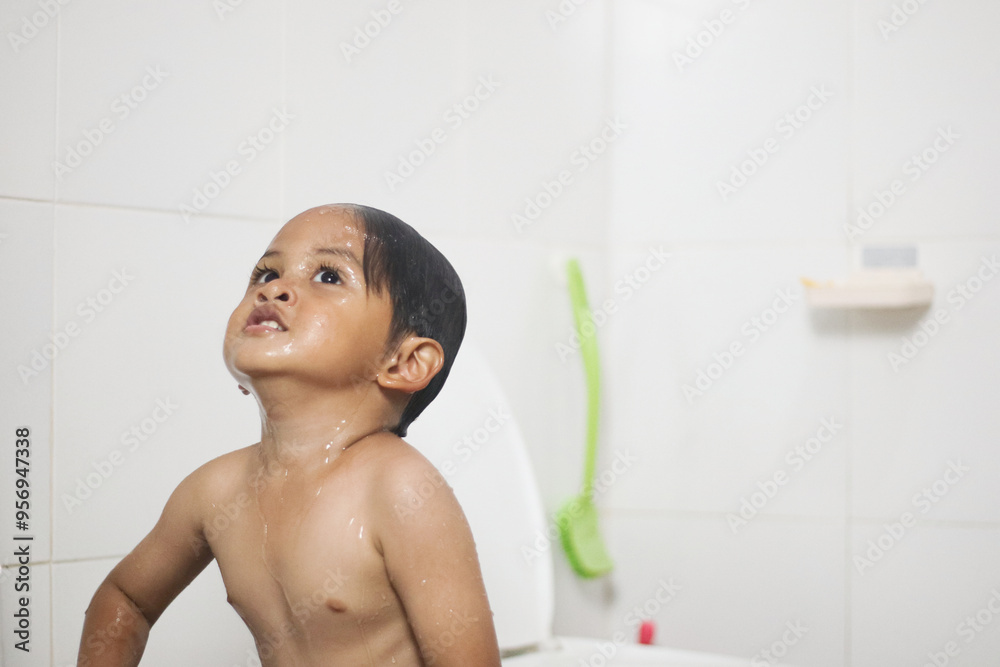 3 years old Asian little boy bathing at home 3 years old Asian little boy bathing at home