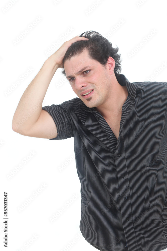 anxious young man looking panicky on isolated white background anxious young man looking panicky on isolated white background