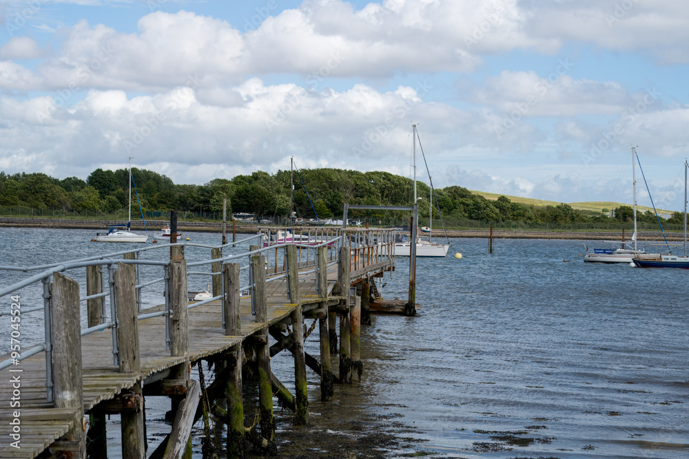 Fototapeta premium old wooden jetty at Portchester Castle Hampshire England