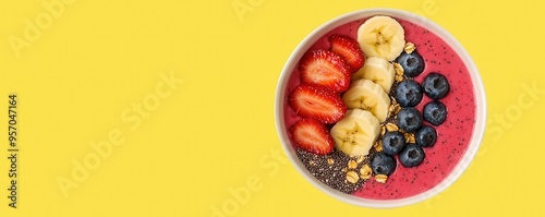 Ultra-detailed image of a colorful smoothie bowl made with organic fruits like strawberries photo