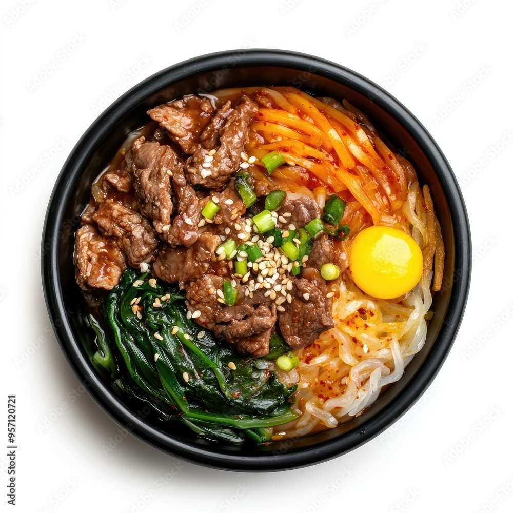 Bibimbap with Beef, Egg, and Vegetables in a Black Bowl Bibimbap with Beef, Egg, and Vegetables in a Black Bowl