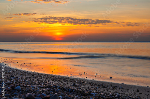 Obraz na płótnie Sandy beach with pebbles of Baltic Sea on Curonian Spit at sunset. Kaliningrad region. Russia w salonie