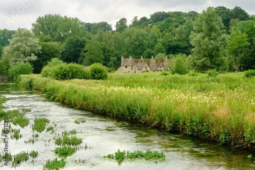 View across River Coln and Rack Isle water meadow to the picture