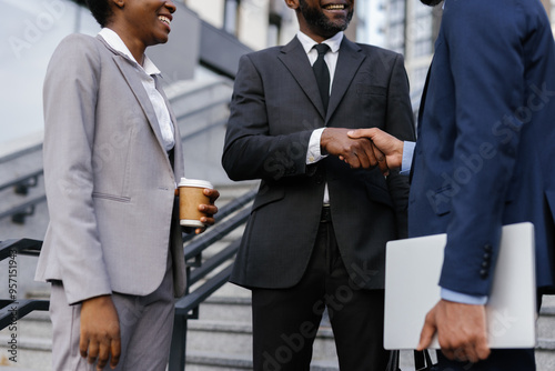 Entrepreneur shaking hand of business partner