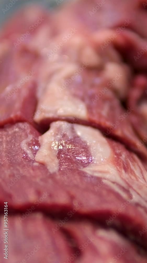Raw pork tenderloin meat sliced medallions, close-up. Stock video 4k Veal tenderloin