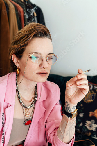 Woman Easing Pain with Medical Cannabis photo