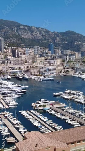 slow panning shot city skyline monaco, blue sea boats vibrant coastal environment architecture city slow panning shot scenic view monaco landmarks cityscape monaco architecture