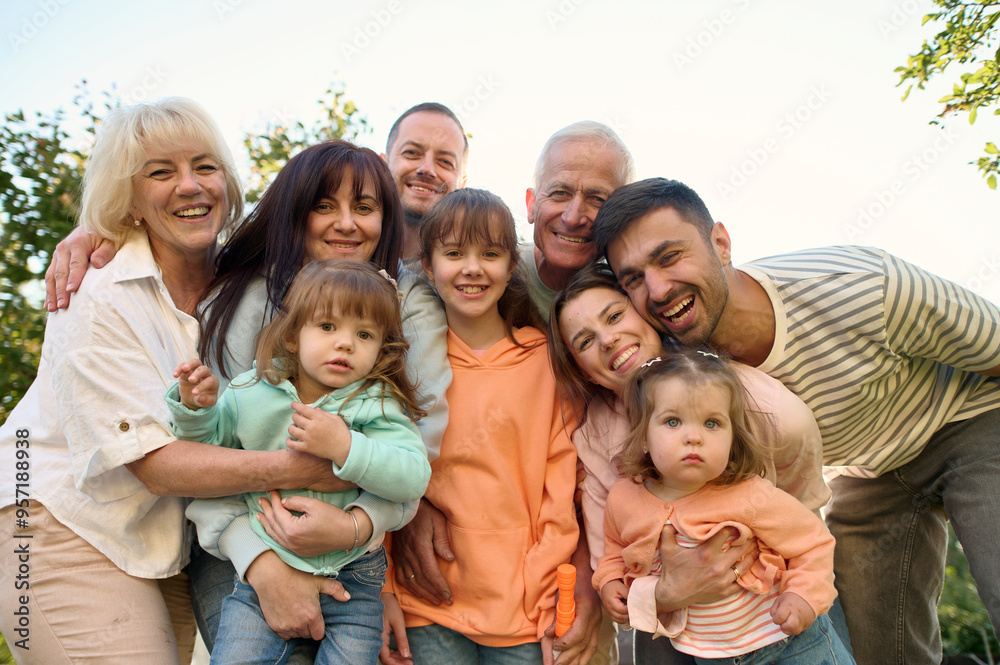 Portrait of a family of several generations in the garden Portrait of a family of several generations in the garden