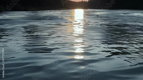 The golden sunset reflects on calm water, creating a magical atmosphere like a dream photo