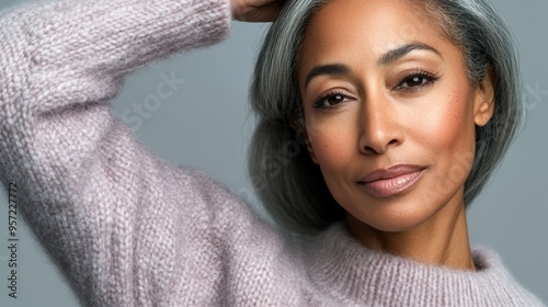 Serene Mature Woman with Silver Hair and Soft Sweater