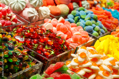 Colorful candy assortment at market in Barcelona, Spain, sweets shop stall