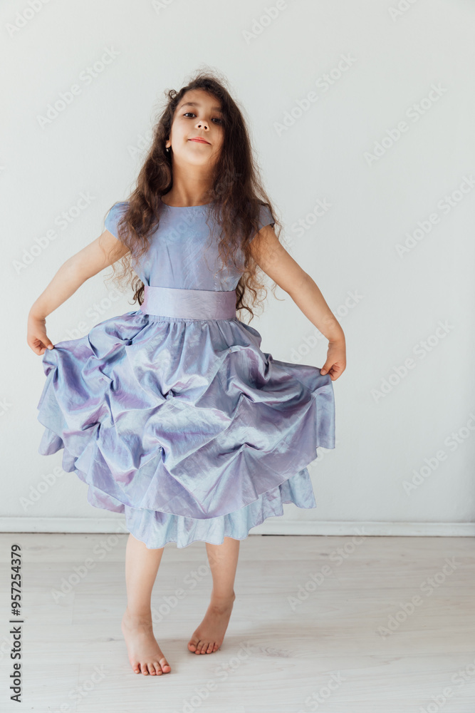 Beautiful Little Curly Girl In Purple Dress Beautiful Little Curly Girl In Purple Dress