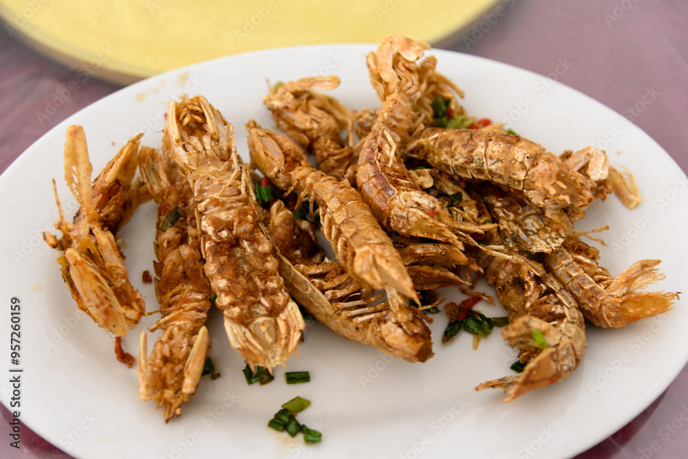Salt and pepper Style mantis shrimp. DeepSea Food. A delicacy from Chaoshan, China. Salt and pepper Style mantis shrimp. DeepSea Food. A delicacy from Chaoshan, China.