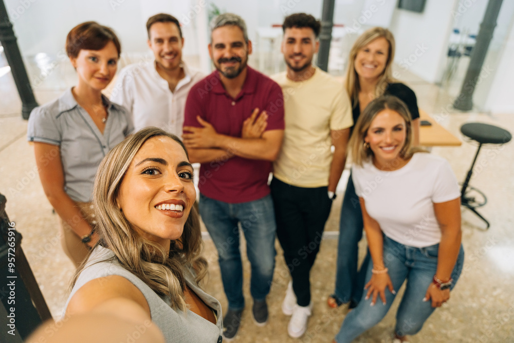 Cheerful business executives taking selfie in office Cheerful business executives taking selfie in office
