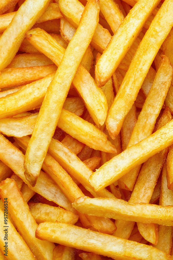Close-Up Of Golden French Fries Background Close-Up Of Golden French Fries Background