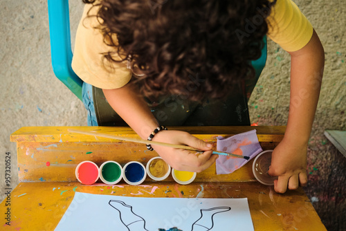 Top view of a child painting photo