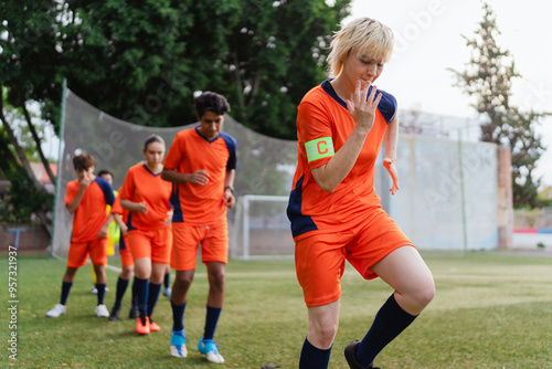 football team working out hard and with passion.  photo