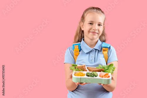 Happy little girl with back...